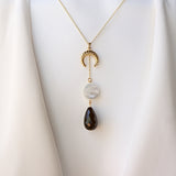 Inverted Crescent Moon Necklace with black onyx and mother of pearl