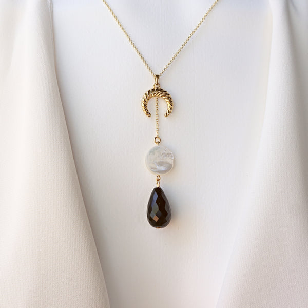 Inverted Crescent Moon Necklace with black onyx and mother of pearl