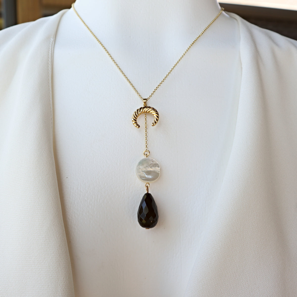 Upside down Crescent Moon Necklace with black onyx and mother of pearl