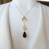 Upside down Crescent Moon Necklace with black onyx and mother of pearl